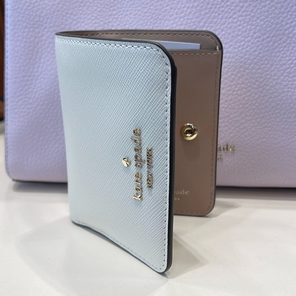 Kate Spade Madison Small Bifold Wallet
Meringue 
NWT - Picture 11 of 16